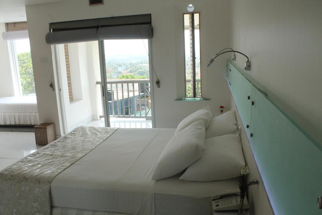 Deluxe Triple Room Balcony,419008023:JPEG